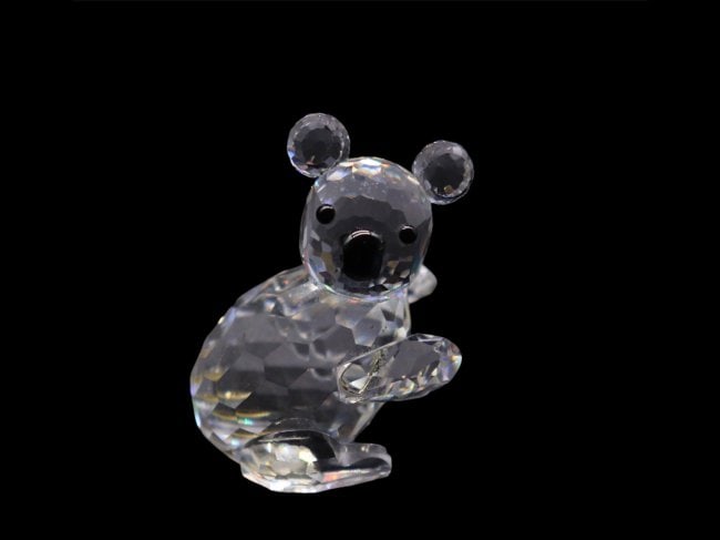 Swarovski Crystal “Endangered Species” Collection - Koala Facing Right Figurine: Swarovski Crystal koala bear facing right figurine, part of the Endangered Species collection in good vintage condition. This piece has no chips, scratches or cracks. So peaceful and delicate. This pi