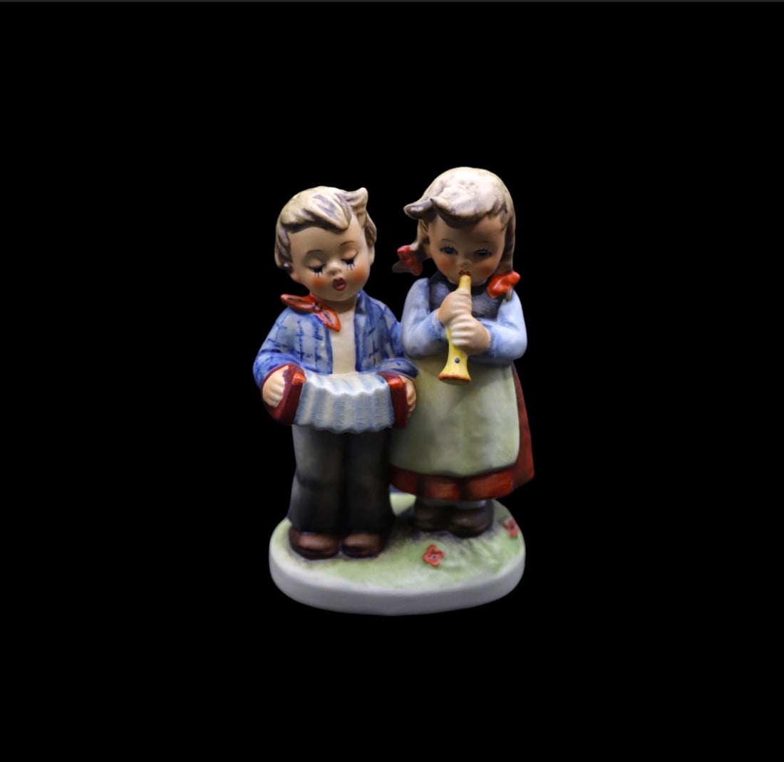 Goebel Hummel Porcelain “Birthday Serenade” #218 2/0 Figurine - TMK6: Adorable Goebel Hummel porcelain figurine titled Birthday Serenade in good vintage condition with no chips, scratches or cracks. There is crazing throughout the entire piece, please refer to the photo