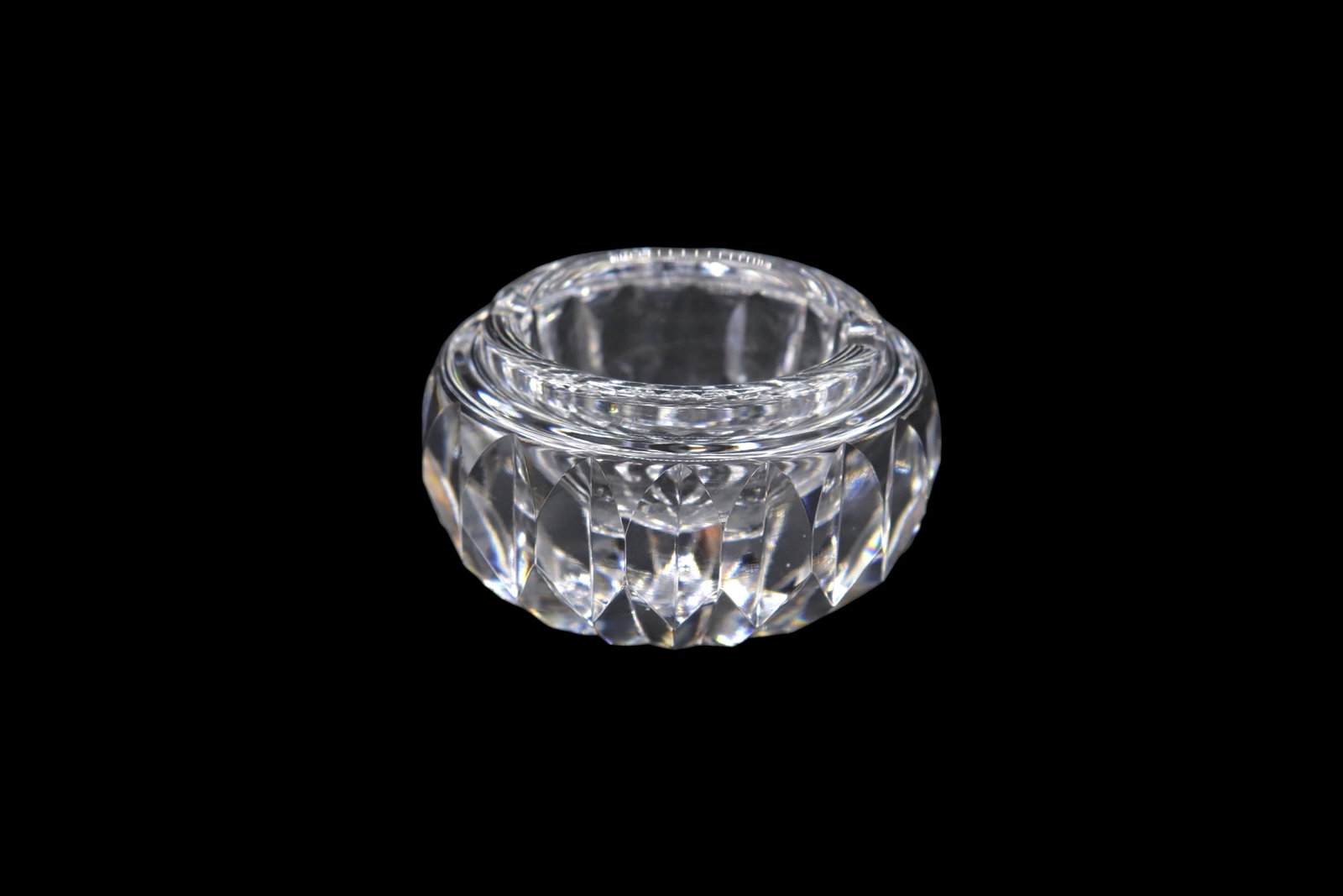 Waterford Crystal Giftware Round Ashtray: Vintage Waterford crystal ashtray in the giftware pattern. The piece shows someCloudiness consistent with use. It is marked on the underside and is approximately 3” inches wide by 2” inche