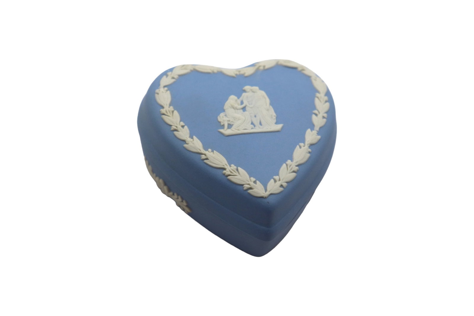 Vintage Wedgwood Cream on Pale Blue Jasperware Small Heart Shaped Trinket Box: Vintage Wedgewood small heart shaped trinket box in the cream and pale blue color. The piece is in great condition showing no noticeable damage or repairs. It features a Greek scene and has since been
