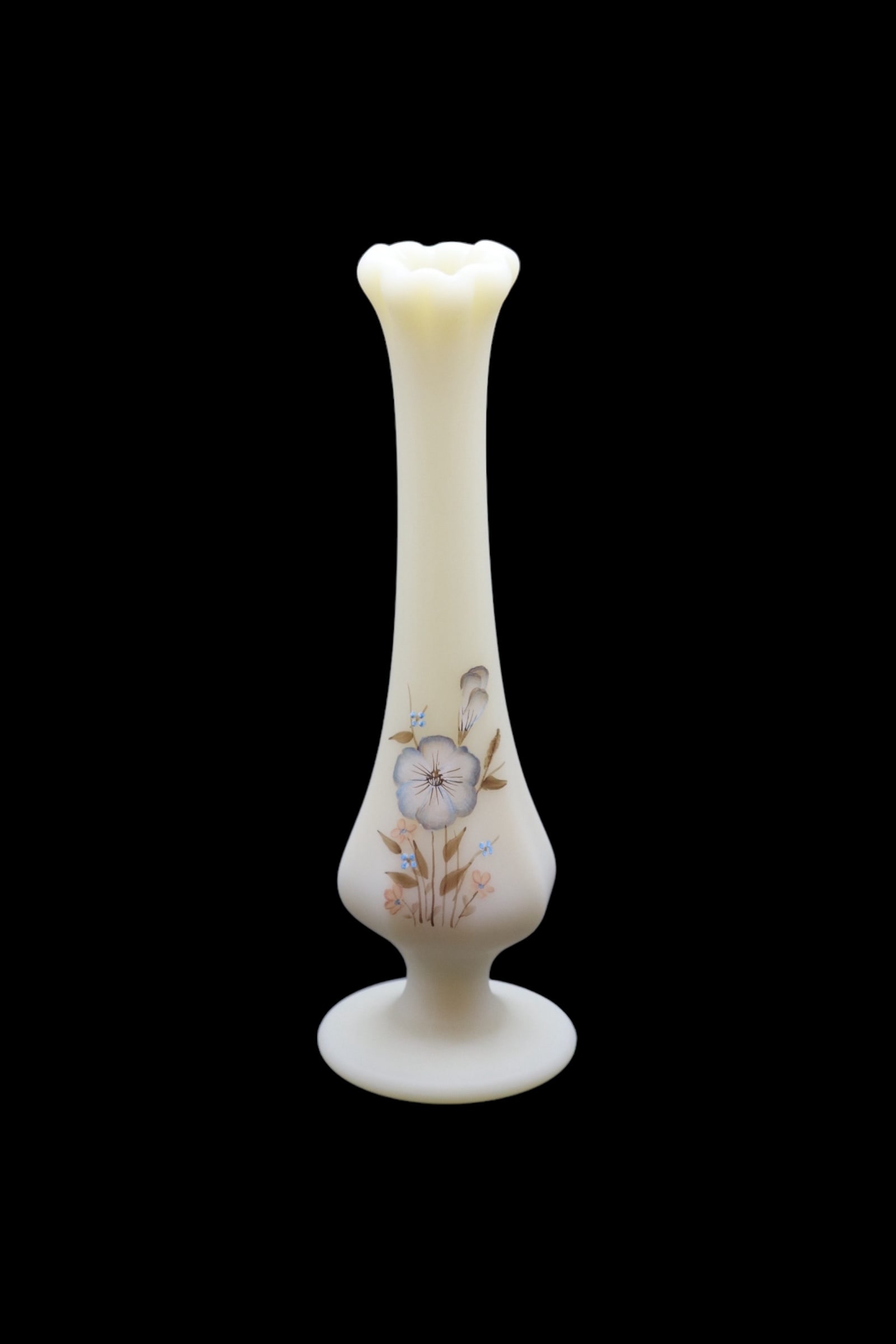 Signed Fenton Art Glass Wildflower on Cameo Color Bud Vase: Adorable Fenton Art glass bud vase in a cameo color with Handpainted wildflowers. This piece is in great condition showing no noticeable damage or repairs. It is signed and is 7 1/2” inches tall