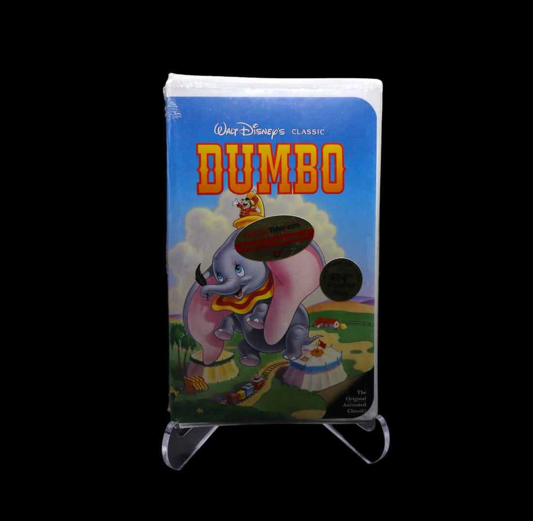 Disney Classic’s Black Diamond Sealed VHS - Dumbo (Cover 1): Sealed Disney Classic’s black diamond VHS of Dumbo (Cover 1 - Dumbo flying alone). The VHS is unopened and is the original tape. Since the piece is unopened it comes as is and we do not know the int