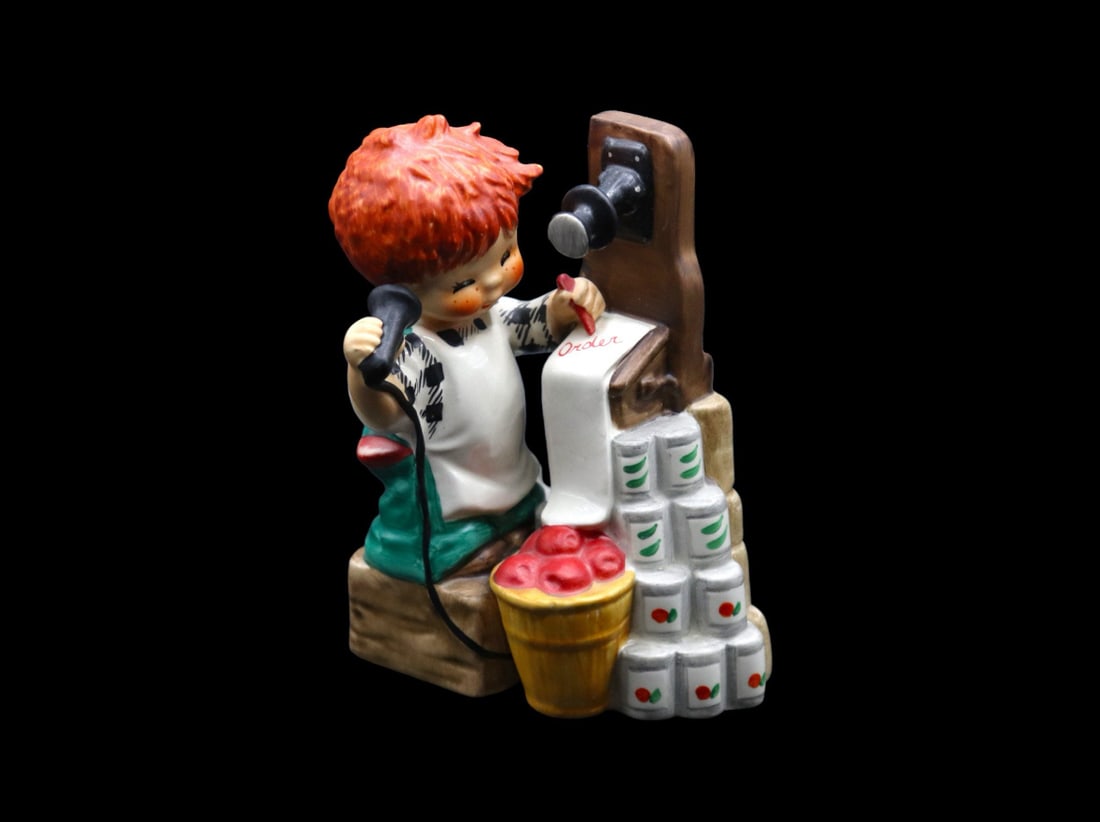 Goebel “Super Service” #BYJ39 Figurine - Red Heads Collection - TMK5: Goebel Germany porcelain figurine titled Super Service from the Red Heads collection released in 1957 and retired in 1988. It is designed by artist Charlot Byj and is TMK5. This piece is in excellent