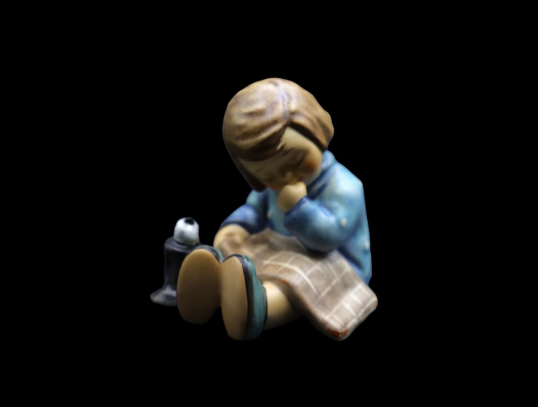 Goebel Hummel Porcelain “A Nap” #534 Figurine with Original Box and COA - TMK6: Goebel Hummel figurine in the A Nap #534 pattern. It features a young girl sucking her thumb while holding her blanket and sleeping. This piece is in excellent vintage condition with no noticeable dam