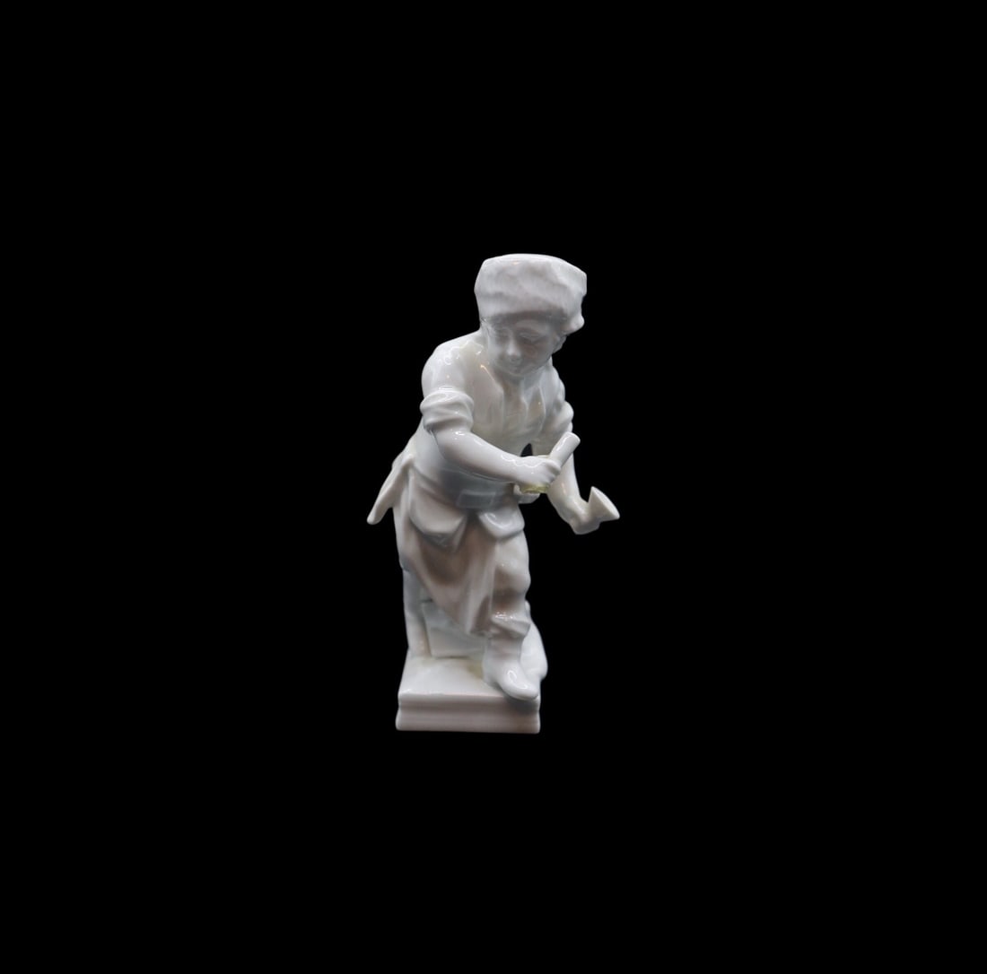 KPM Berlin Meyer “Zodiacs Series” Boy Porcelain Figurine - December / Capricorn: KPM Berlin Meyer Blanc de Chine porcelain figurine from the Zodiac series featuring the month of December which is Capricorn and is the twelfth in the series. The piece is in excellent vintage conditi