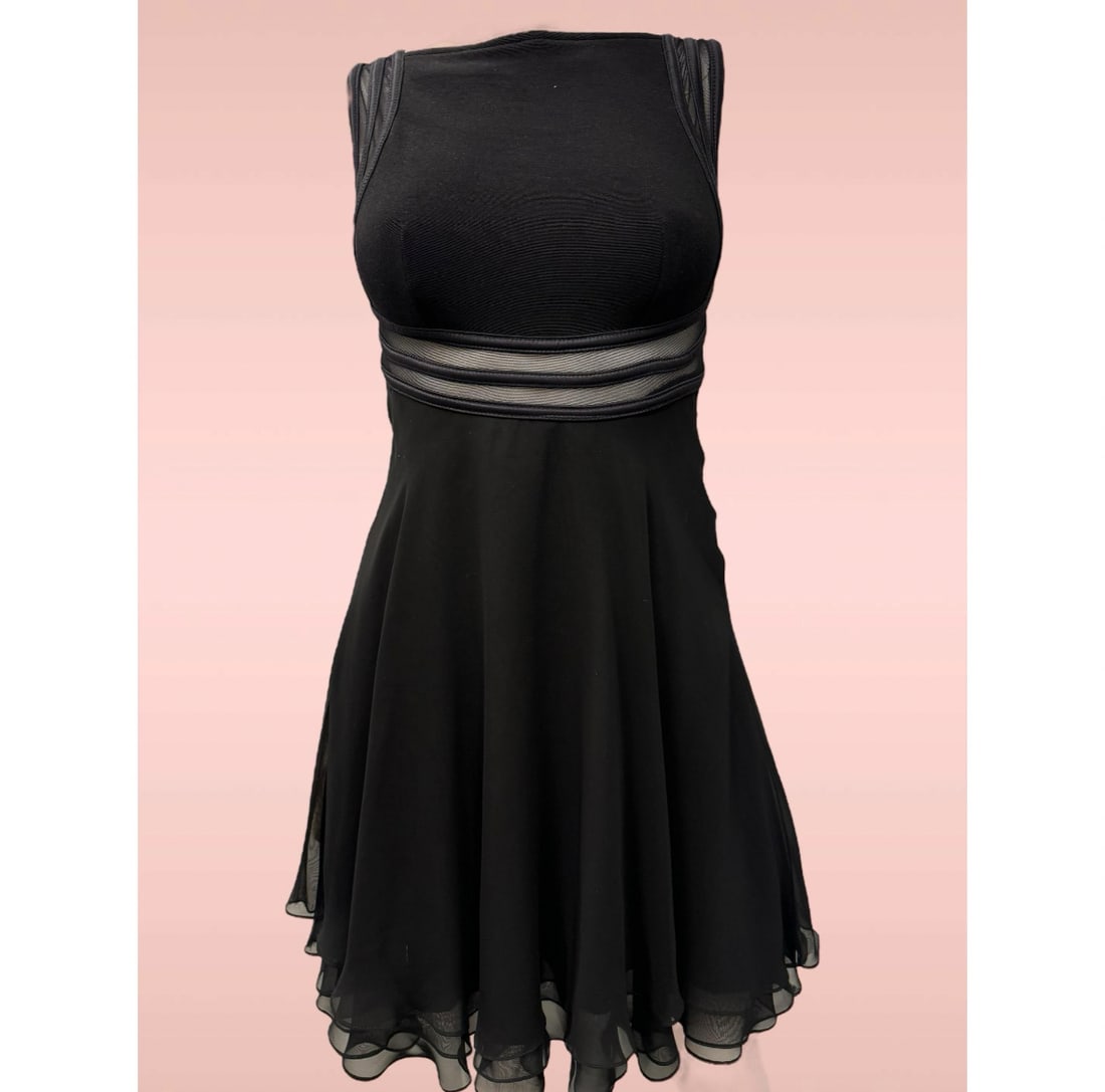 Vintage Pre-Owned Women’s Lillie Rubin Corset Style Black Dress - Size 2: Lillie Rubin black corset style lace up dress in great vintage condition with no noticeable damage, no rips, no stains and no repairs. This is a nylon blend dress and has some piping design. It is cut