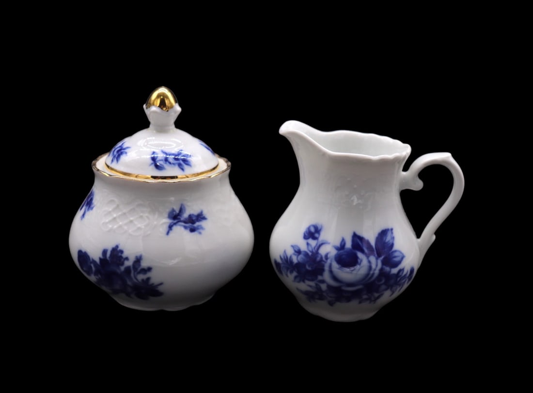 Schumann Arzberg Echt Cobalt Blue Roses Porcelain Sugar Bowl and Creamer: Schumann Arzberg Echt Cobalt Blue roses porcelain sugar bowl with lid and creamer in good vintage condition with no chips or cracks to the creamer and the lid of the sugar bowl has been repaired. Ther