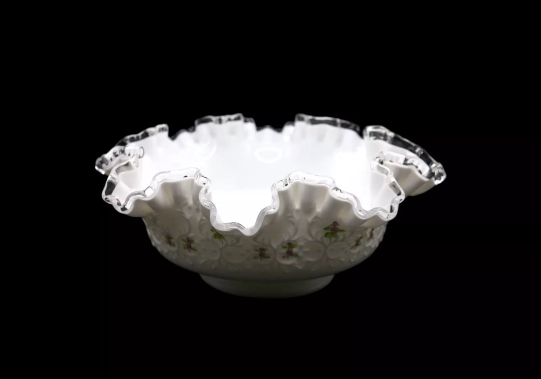 Fenton Art Glass “Violets in the Snow” Spanish Lace 9” Round Crimped Bowl: Fenton Art Glass “Violets in the Snow” Spanish Lace round crimped bowl featuring a delicate ruffled edge and hand-painted violets. Standing 9 5/8 inches tall, it showcases intricate craftsmans