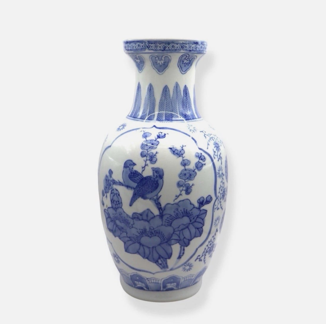 Vintage Chinoiserie Blue & White Hand Painted Porcelain Vase: Vintage chinoiserie blue and white hand painted vase in great condition with no noticeable damage or repairs. The piece features a scene of bird and flowers. The piece displays beautifully and would b