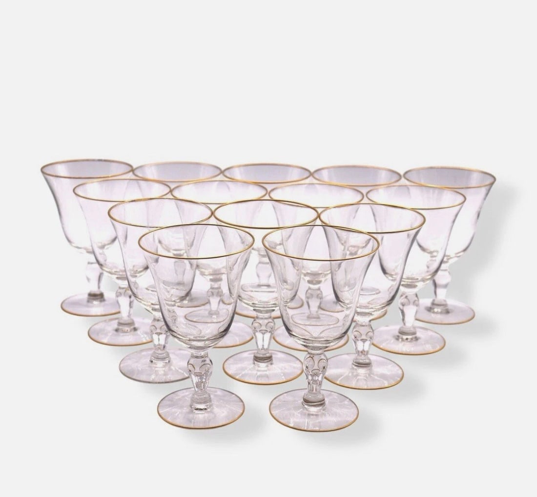 (14) Glastonbury Lotus Princess House Gold Trim Water Goblets: Set of 14 Glastonbury Lotus Princess House Gold Trim Water Goblets standing 5 7/8 inches tall and featuring an elegant flared bowl, a delicate gold trim, and a finely crafted stem. These timeless piec