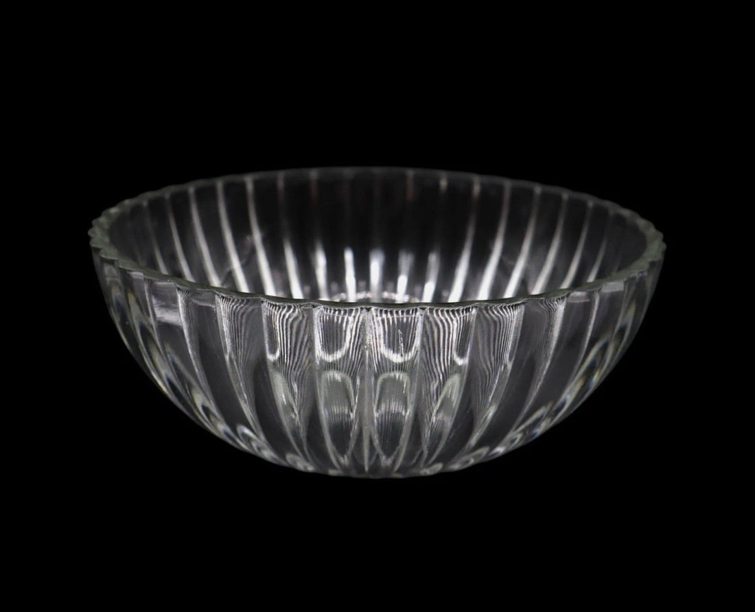 Vintage Jeannette “National Clear” 9” Salad Bowl: Jeannette “National Clear” 9” Salad Bowl is a featuring an elegant paneled design. Measuring 9 3/4 inches wide, this bowl is perfect for serving salads, fruits, or side dishes. In excell