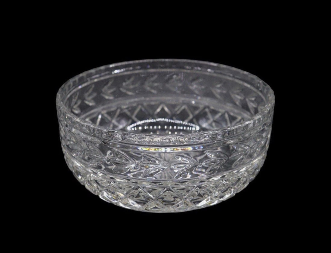 Vintage Waterford Style Cut Lead Crystal Decorative Bowl: Waterford style decorative bowl featuring deep cuts and diamond patterns as well as a leaf design. The piece is in great condition showing no noticeable damage or repairs. The piece is approximately 4