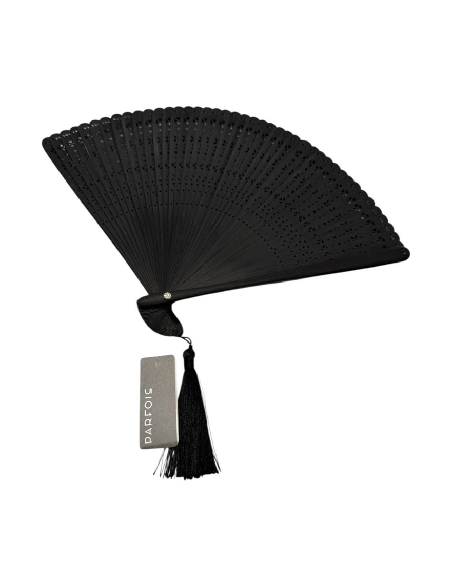 NWT Parfois France Black Perforated Bamboo Hand Fan W/ Tassel: The NWT Parfois France Black Perforated Bamboo Fan with Tassel is a stylish and unique vintage accessory. Made from bamboo and boasting a boho look, this hand fan exudes a chic and edgy vibe. Crafted 