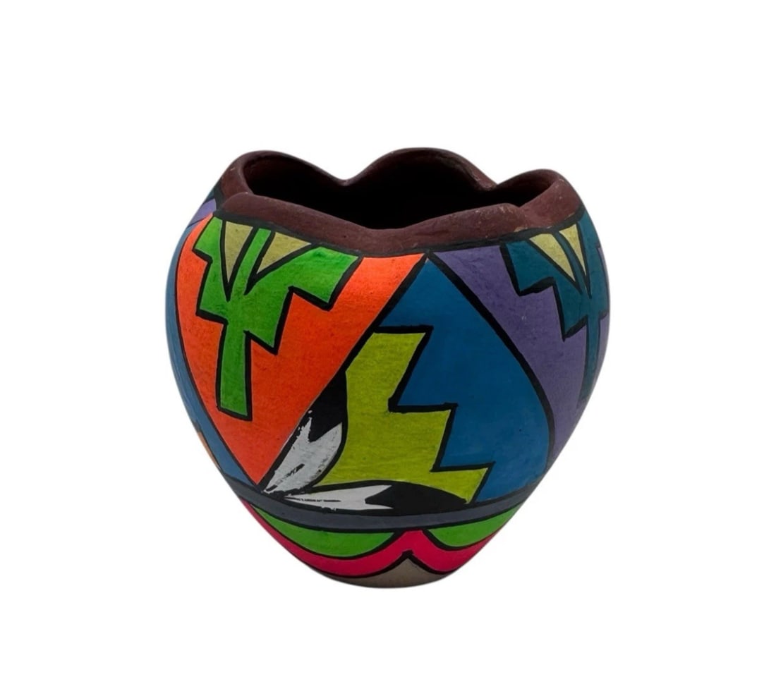 Native American Jemez Pueblo Handmade 3.5" Pottery Jar Rose Bowl: This product is a 3.5" pottery jar or rose bowl made by Native American artisans from the Jemez Pueblo tribe in the United States. The item is handmade, showcasing the traditional craftsmanship and cu