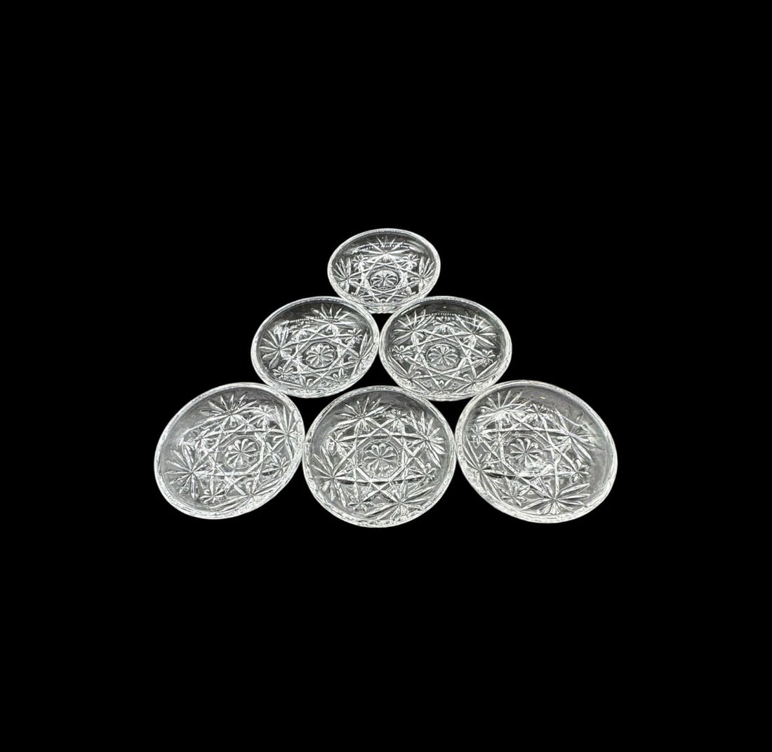 Anchor Hocking Prescut Clear Coasters - Set Of 6: The Anchor Hocking Prescut Clear Coasters are a set of 6 original glass coasters manufactured in the 1960s. These stackable coasters are made of pressed glass and feature a decorative design that adds