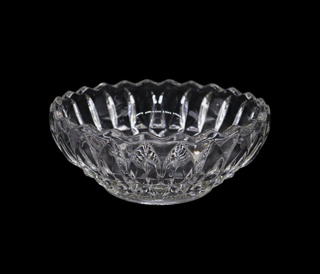 Indiana Glass Co. “Lotus Blossom Clear” 9” Cupped Bowl: Indiana Glass Co. “Lotus Blossom Clear” cupped bowl, measuring 9 5/8 inches wide. This elegant pressed glass piece features a stunning lotus-inspired design with intricate detailing and a scal
