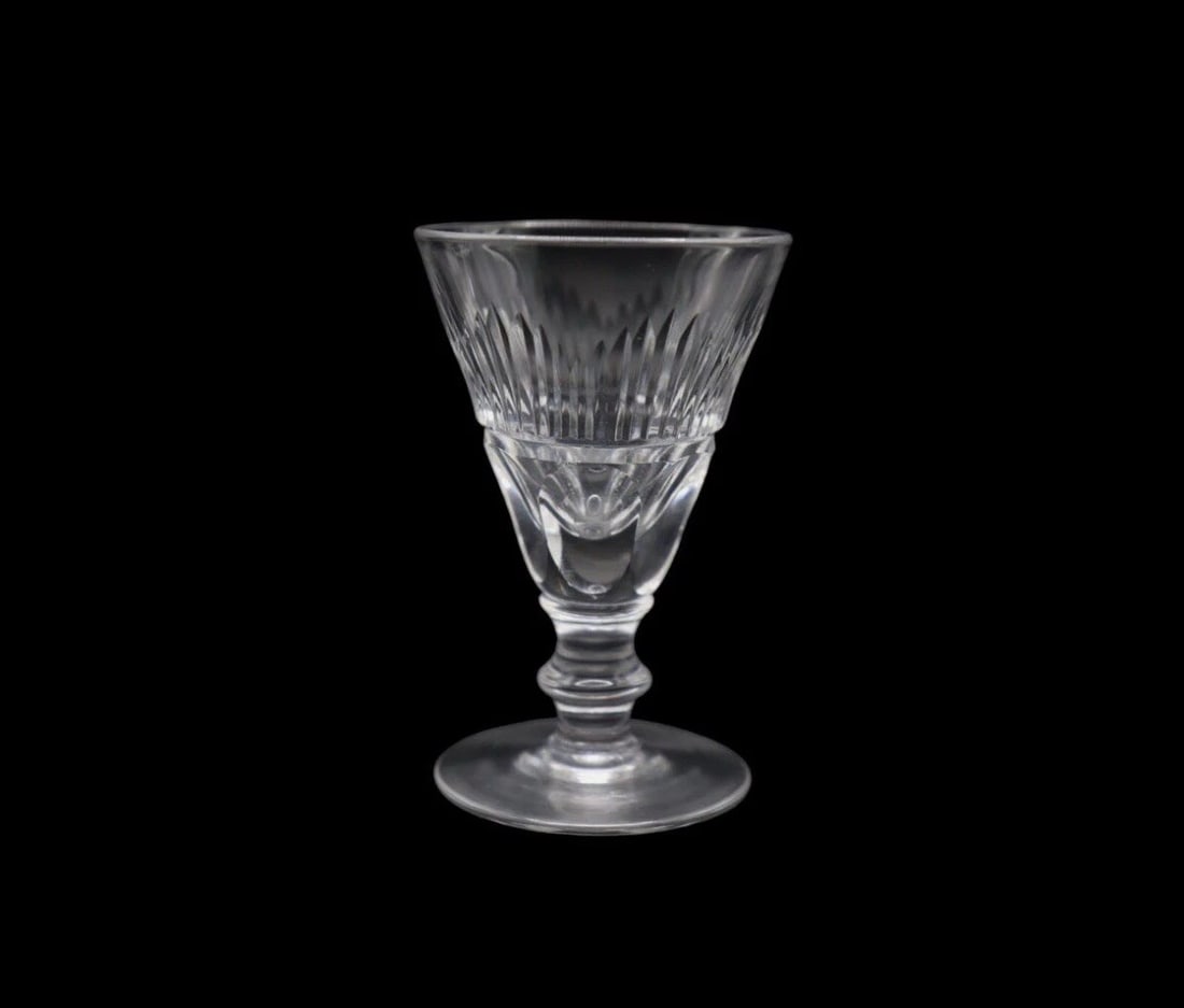 Waterford Crystal “Mourne” Cordial Glass: The Waterford Crystal "Mourne" Cordial Glass is an elegant and vintage piece originating from Ireland in the 1970s. Made of clear crystal with a contemporary decorative design, this cordial glass is p