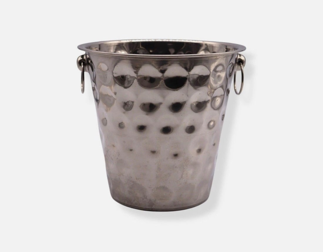 Vintage Hammered Stainless Steel Ice Bucket - Made in India: Vintage hammered stainless steel ice bucket, made in India, featuring a textured, dimpled surface that enhances its timeless appeal. Measuring 8 inches tall and 9 inches wide, it is in great condition