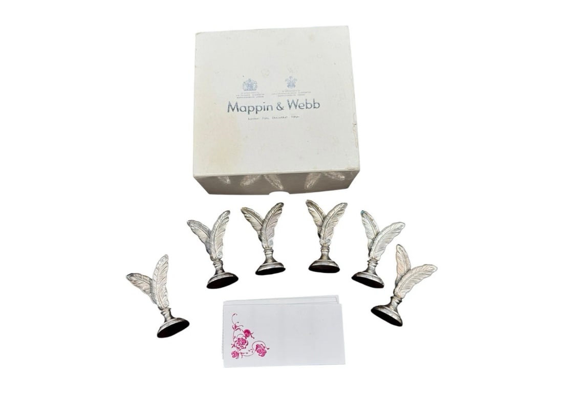 Vintage Mappin & Web Silverplate Feather Placecard Holders Set Of 6: This set of 6 vintage Mappin & Webb silverplate feather placecard holders is a charming and elegant addition to any table setting. Dating back to the Art Deco era between 1900-1940, these placecard ho