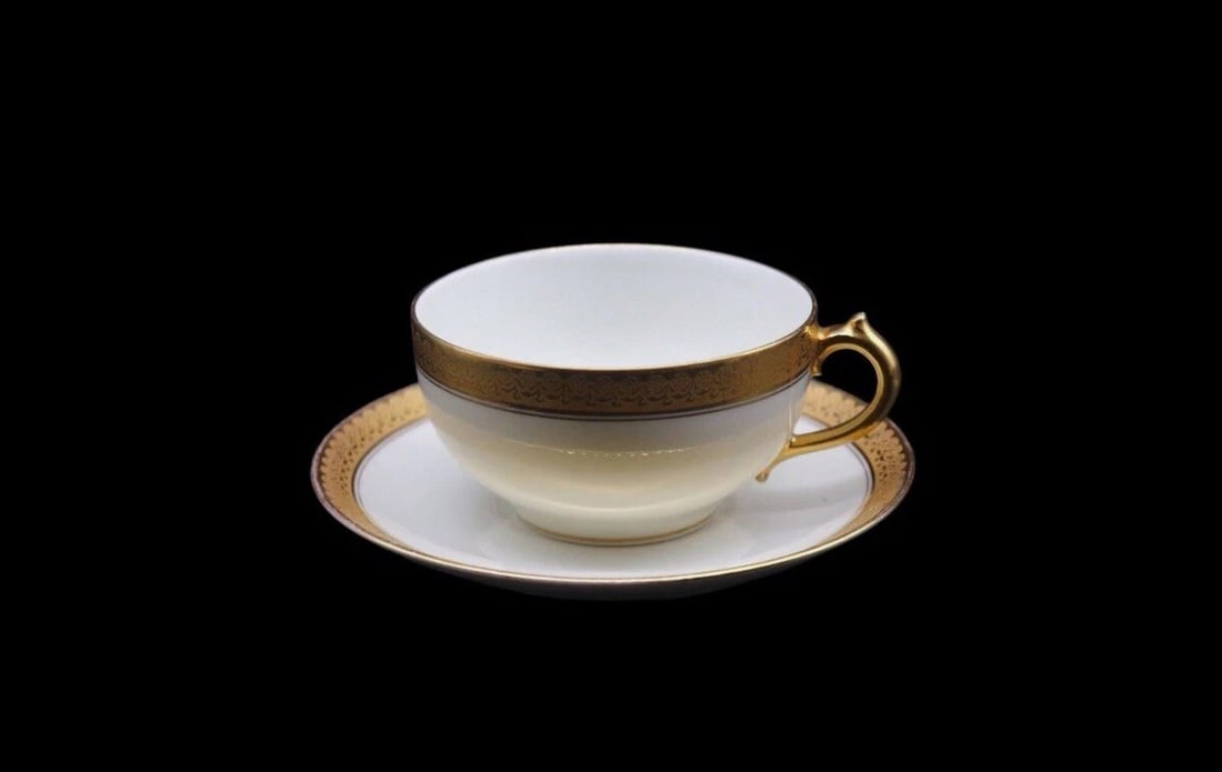 Gerard, Dufraisseix & Abbot Limoges “GDA35” Flat Cup and Saucer: Gerard, Dufraisseix & Abbot flat cup and saucer set in the GDA35 pattern which has since been discontinued. The set is in great vintage condition with loss of some of the paint on the trim and no othe