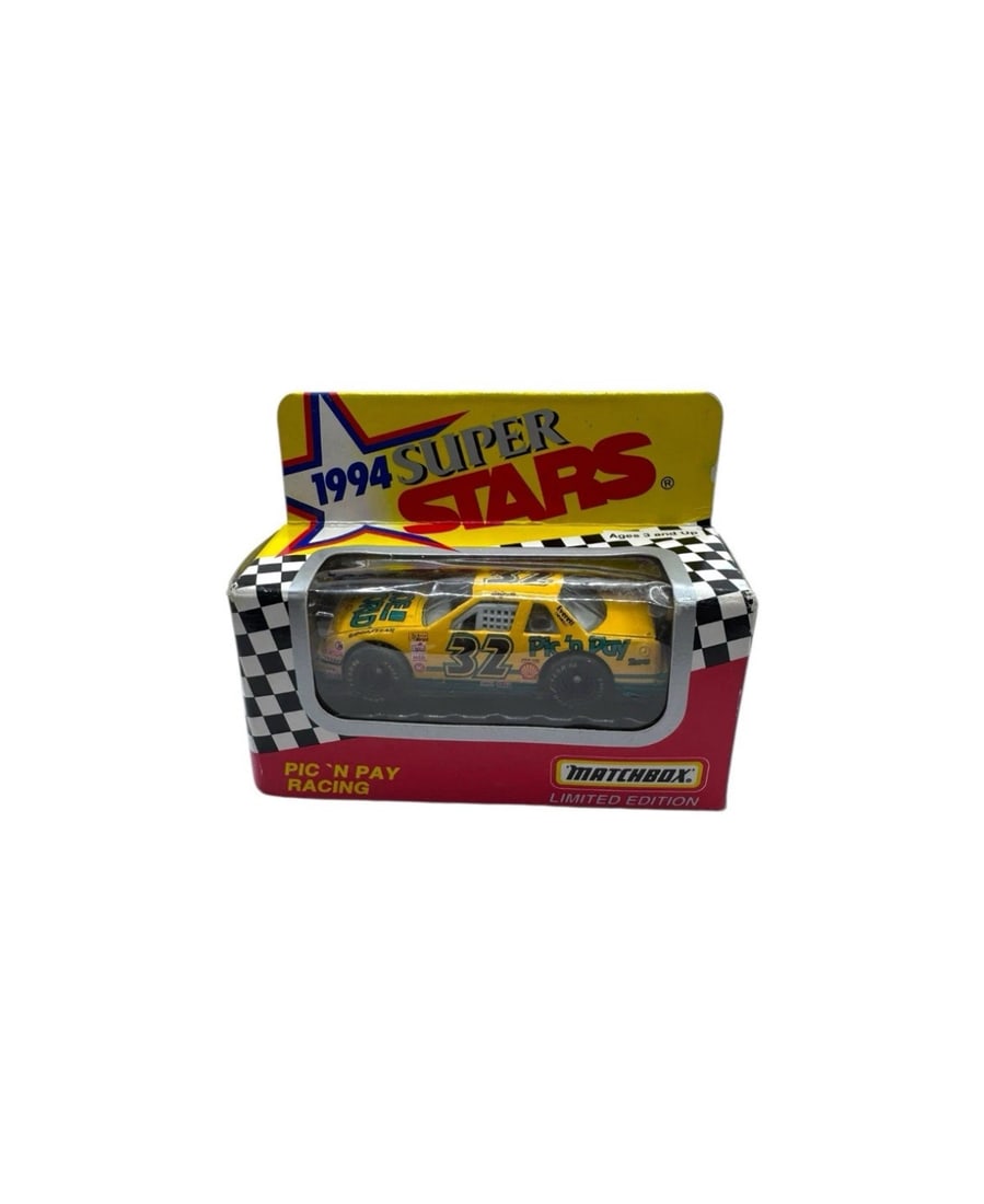 Dale Jarrett Matchbox 1994 Super Stars Limited Edition Pic N Pay Racing #32: The product is a limited edition Dale Jarrett Matchbox car from 1994, part of the Super Stars series for Pic N Pay Racing. This 1:64 scale diecast vehicle features the NASCAR driver Dale Jarrett, maki