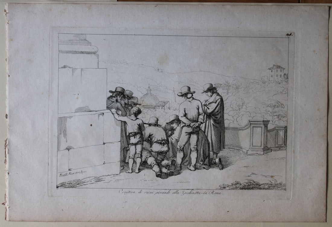 Comitiva di oziosi giocando by B Pinelli 1809: This etching is from Raccolta di Cinquanta Costumi Pittoreschi incisi all acqua forte da Bartolomeo Pinelli Romano. Published by Lorenzo Lazzari, Rome 1809.This plate is entitled: Comitiva di oziosi g