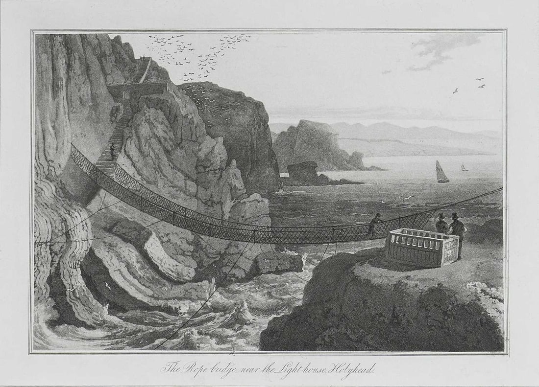 W Daniell - Rope Bridge, Holyhead c1820: This engraving is from A Voyage Round Great Britain by William Daniell. Printed by Longman, Hurst, Rees, Orme and Brown, London, 1814-25.The engravings in this work were drawn Daniell and engraved by
