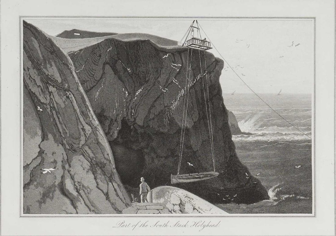 W Daniell - South Stack, Holyhead c1820: This engraving is from A Voyage Round Great Britain by William Daniell. Printed by Longman, Hurst, Rees, Orme and Brown, London, 1814-25.The engravings in this work were drawn Daniell and engraved by