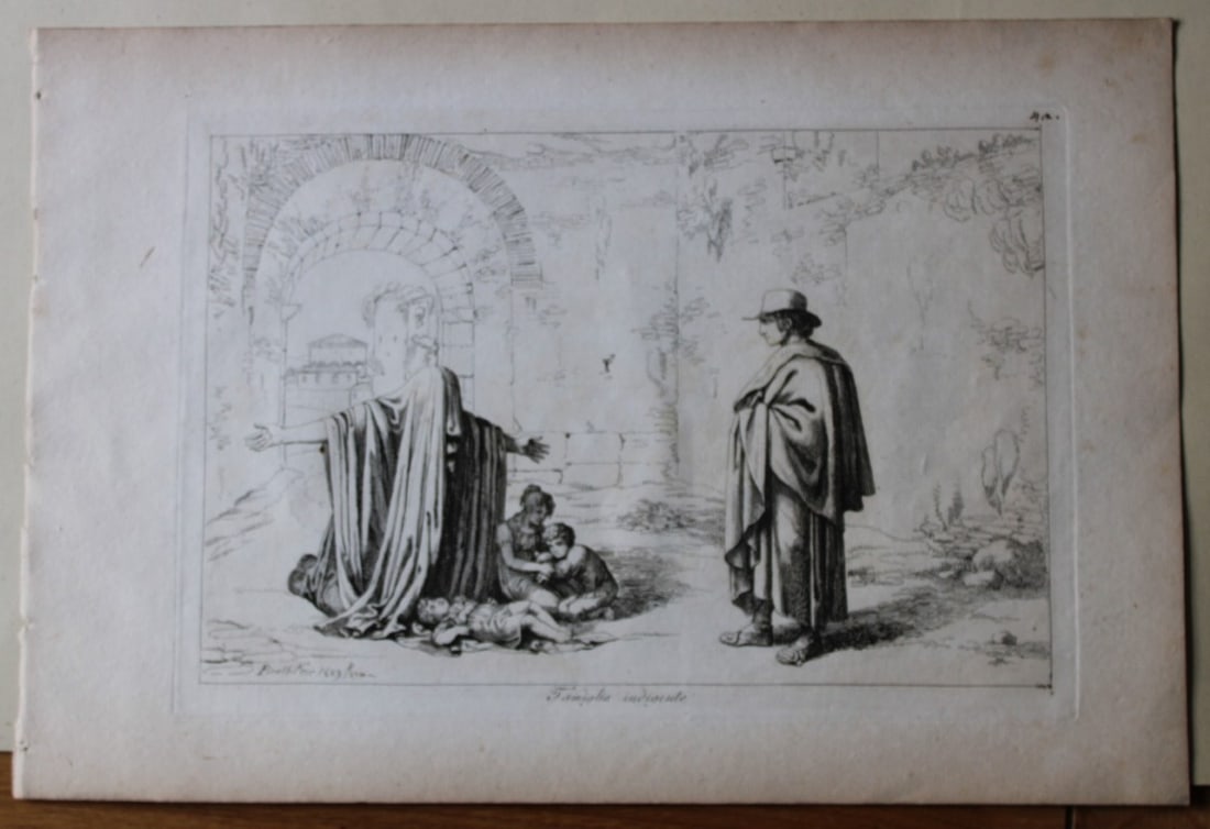 Famiglia indigente by B Pinelli from Costumi Pittoreschi 1809: This etching is from Raccolta di Cinquanta Costumi Pittoreschi incisi all acqua forte da Bartolomeo Pinelli Romano. Published by Lorenzo Lazzari, Rome 1809.This plate is entitled: Famiglia indigenteTh