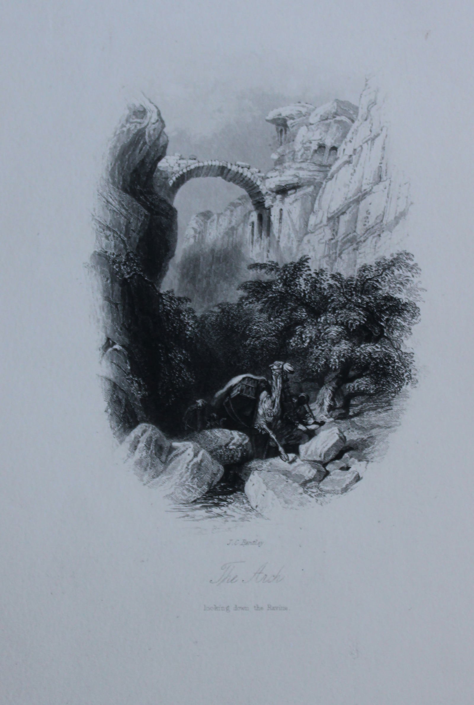 WH Bartlett - The Arch, Petra Jordan engraved by JC Bentley 1849: The Arch, looking towards the Ravine at Petra engraved by J.C.Bentley, published in Forty Days in the Desert. Published by Arthur Hall & Co, London 1849. Size 6.5in x 9.5in (16.5cm x 24cm)