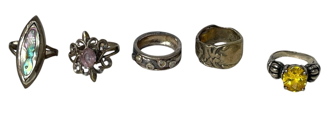 Silver Ring Collection: AUTHENTICATION HAS NOT BEEN PERFORMED TO GUARANTEE VERIFICATION | All purchases are made at the buyers discretion