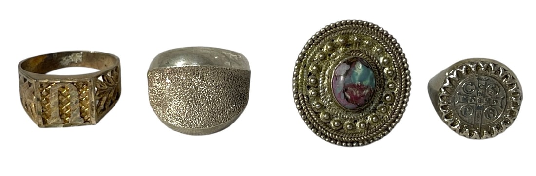 Silver Ring Collection: AUTHENTICATION HAS NOT BEEN PERFORMED TO GUARANTEE VERIFICATION | All purchases are made at the buyers discretion