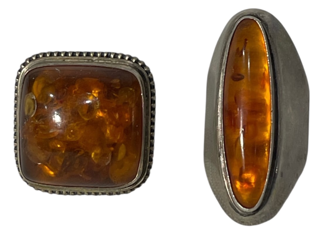 Silver Amber Ring Collection: AUTHENTICATION HAS NOT BEEN PERFORMED TO GUARANTEE VERIFICATION | All purchases are made at the buyers discretion