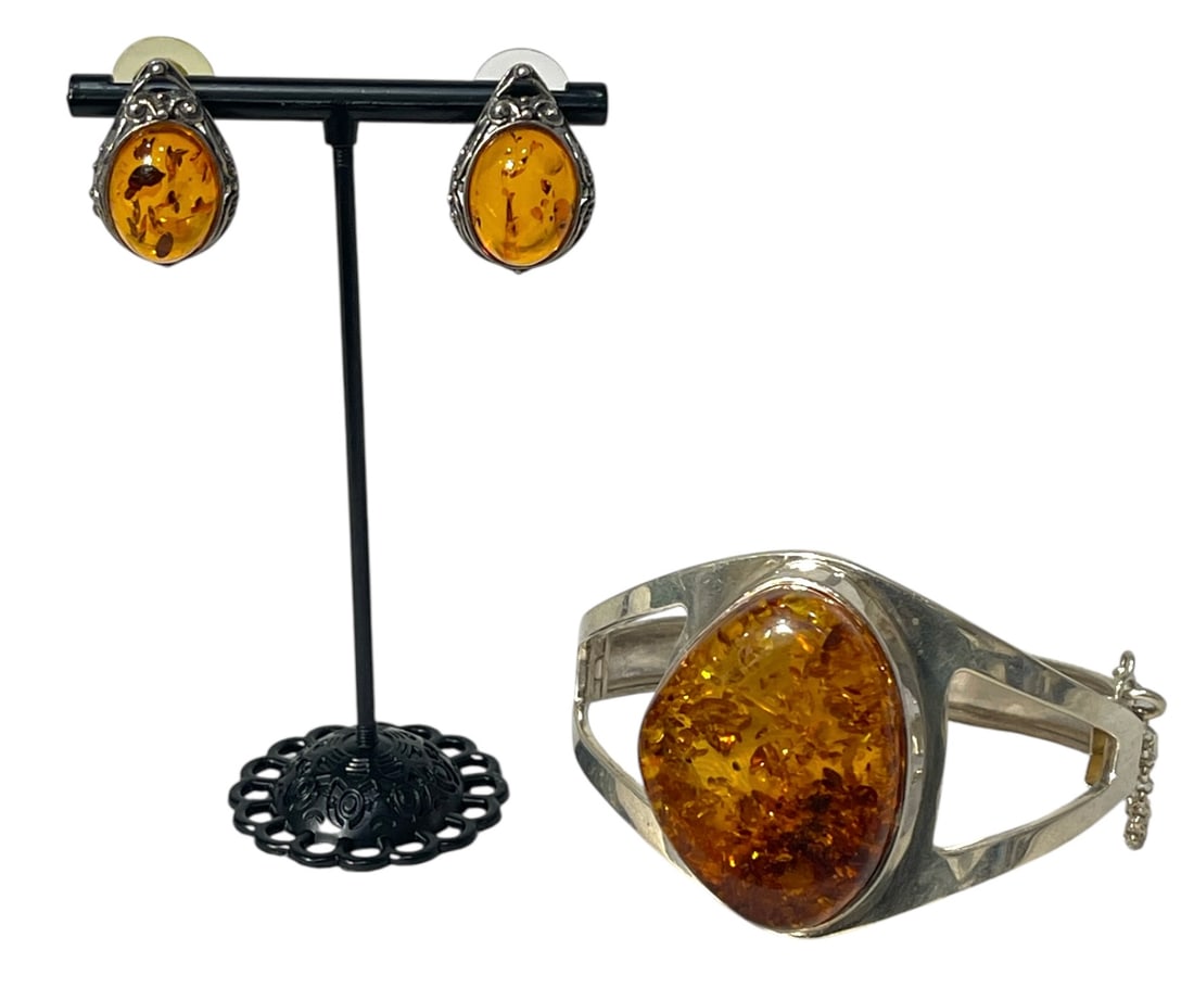 Silver Amber Earring and Bracelet Collection: AUTHENTICATION HAS NOT BEEN PERFORMED TO GUARANTEE VERIFICATION | All purchases are made at the buyers discretion