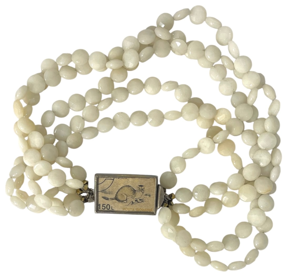 Round Shell or Mother of Pearl Beaded Necklace and a Unique Silver Tone Clasp: AUTHENTICATION HAS NOT BEEN PERFORMED TO GUARANTEE VERIFICATION | All purchases are made at the buyers discretion