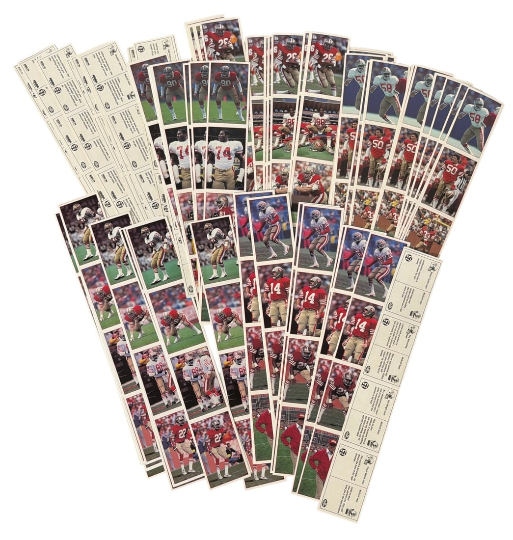 Uncut Football Trading Card Collection: AUTHENTICATION HAS NOT BEEN PERFORMED TO GUARANTEE VERIFICATION | All purchases are made at the buyers discretion