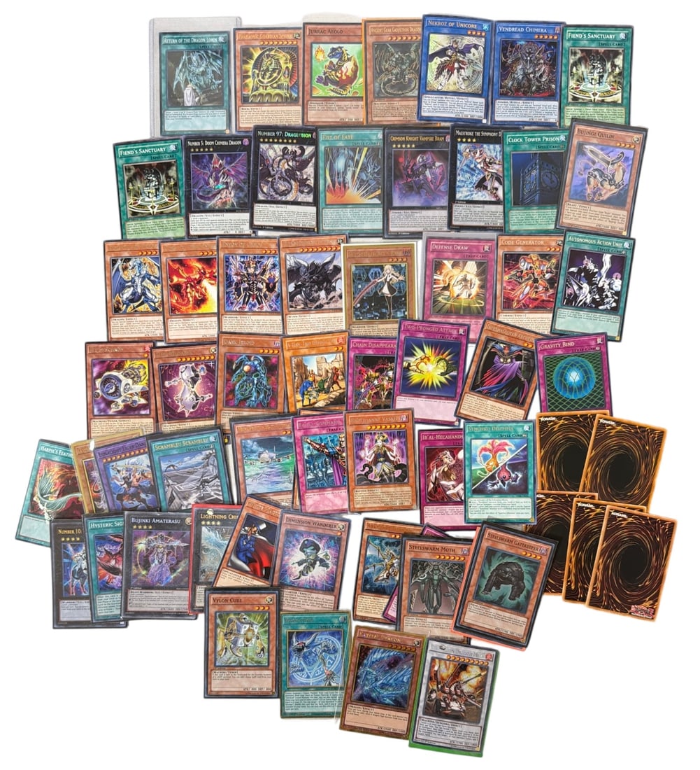 Yu Gi Oh Trading Card Collection: AUTHENTICATION HAS NOT BEEN PERFORMED TO GUARANTEE VERIFICATION | All purchases are made at the buyers discretion