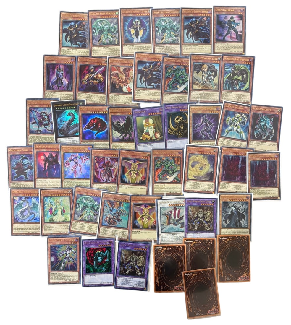 Yu Gi Oh Trading Card Collection: AUTHENTICATION HAS NOT BEEN PERFORMED TO GUARANTEE VERIFICATION | All purchases are made at the buyers discretion