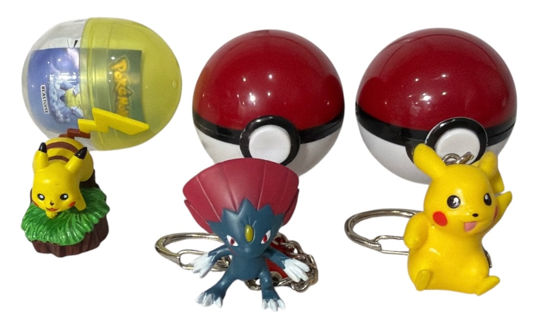 Pokemon Keychain with Pokeball Container and Pikachu Figure on a Base Collection: Pokemon Keychain with Pokeball Container and Pikachu Figure on a Base Collection