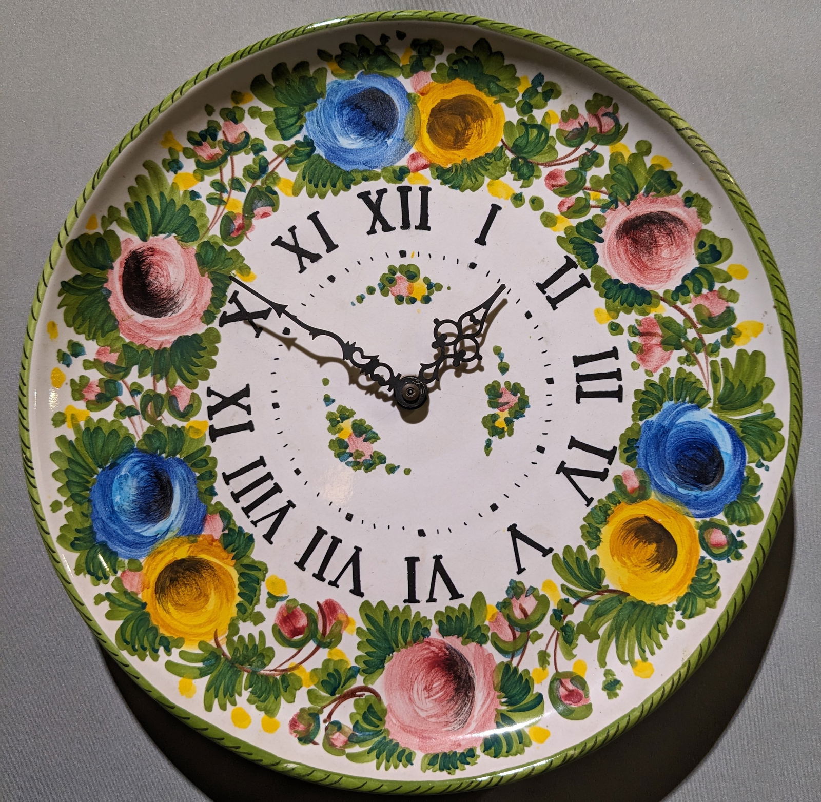 Working Vintage Ceramic Floral Clock: Working Vintage Ceramic Floral Clock.12.5" x 12.5" x 2.25"In-house shipping is available for smaller items. Shipping is available for larger and other fragile items through Pac Mail, which is a local