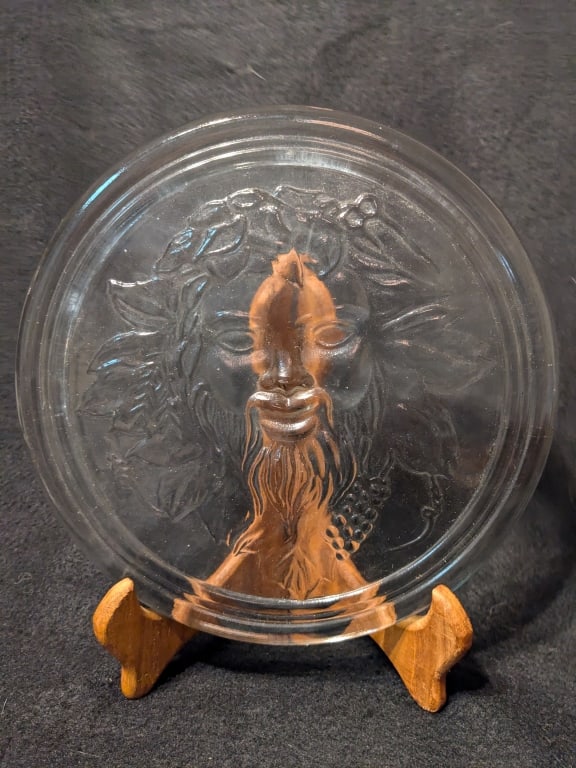 Pan, God of Wine, Glass Plate: Pan, God of Wine, Glass Plate.0.5" x 10"In-house shipping is available for smaller items. Shipping is available for larger and other fragile items through Pac Mail, which is a local shipping option.