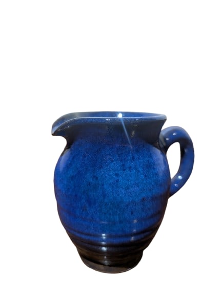 Harding Black- Blue & Black Pitcher: Harding Black- Blue & Black Pitcher. 4.75" x 5.75" x 3.25" In-house shipping is available for smaller items. Shipping is available for larger and other fragile items through Pac Mail, which is a