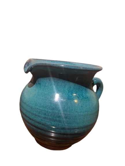 Harding Black- Teal Pitcher: Harding Black- Teal Pitcher. 4.75" x 6.25" x 4.25" In-house shipping is available for smaller items. Shipping is available for larger and other fragile items through Pac Mail, which is a local