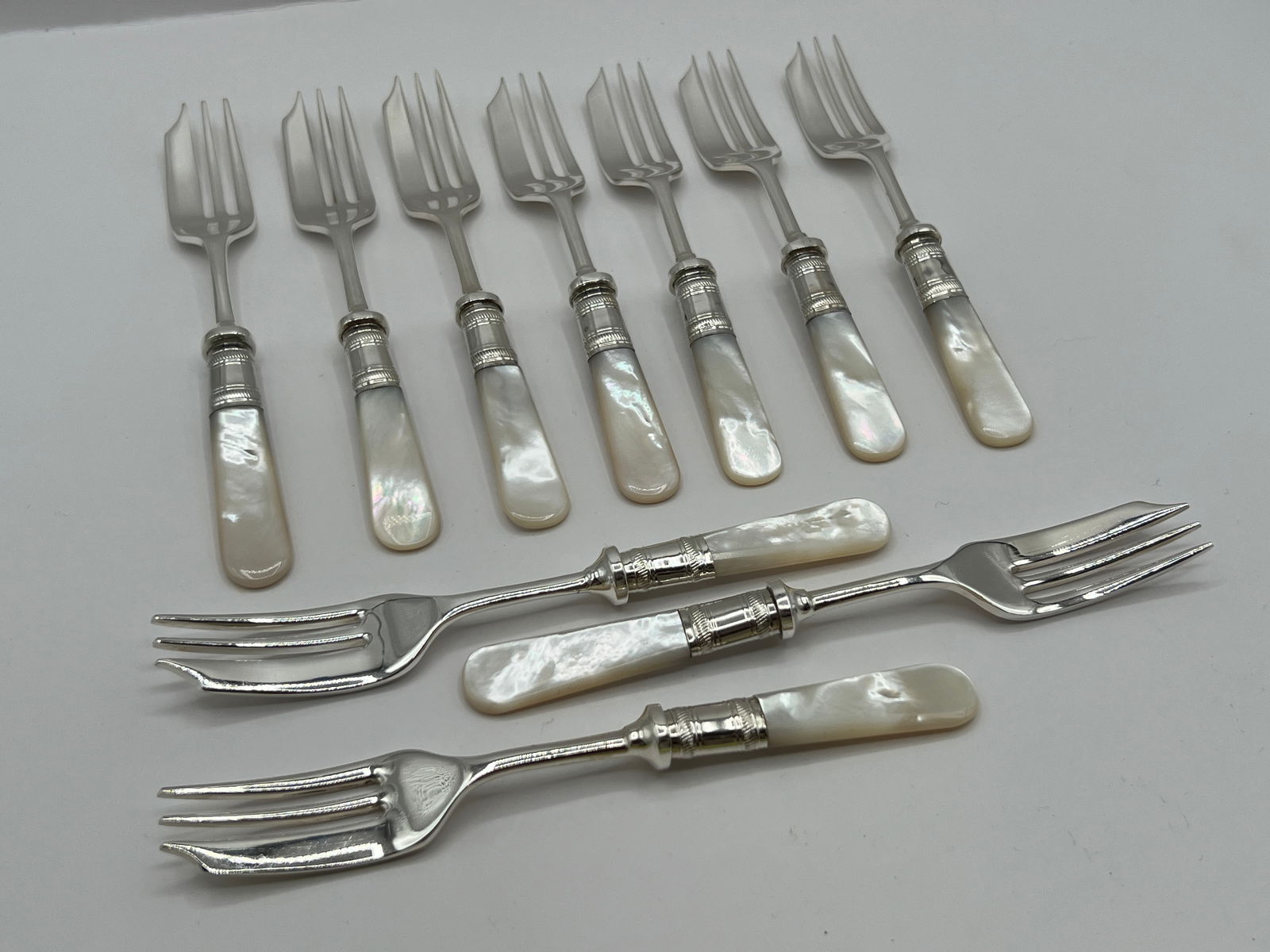 Mother of Pearl Handled Silver Plate Stamped Fish Forks (1 of 8)