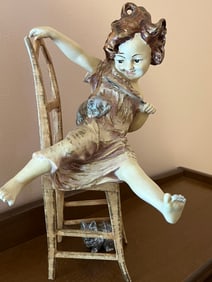 Cast Iron Girl in Chair Doorstop