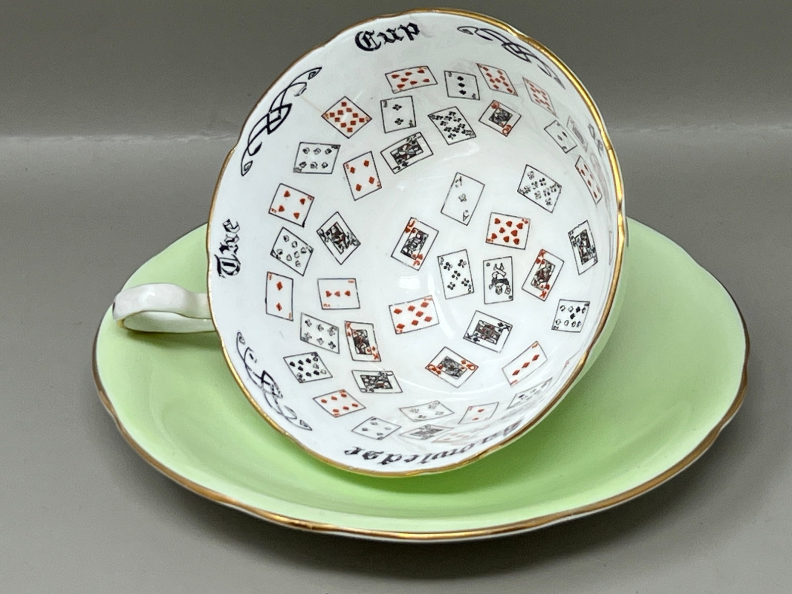 Aynsley "Cup of Knowledge" Fortune Telling Teacup Saucer: some relief of painting, noted in photos. for tea leaf reading