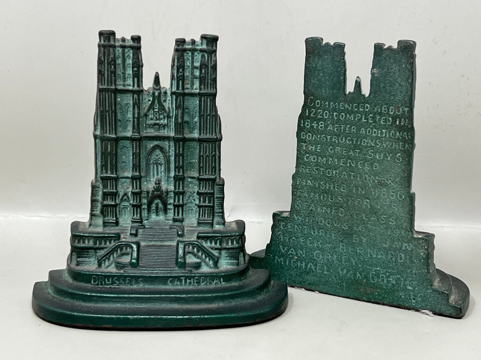 Cast Iron Brussels Castle Bookends: great condition, nice and heavy for their small stature