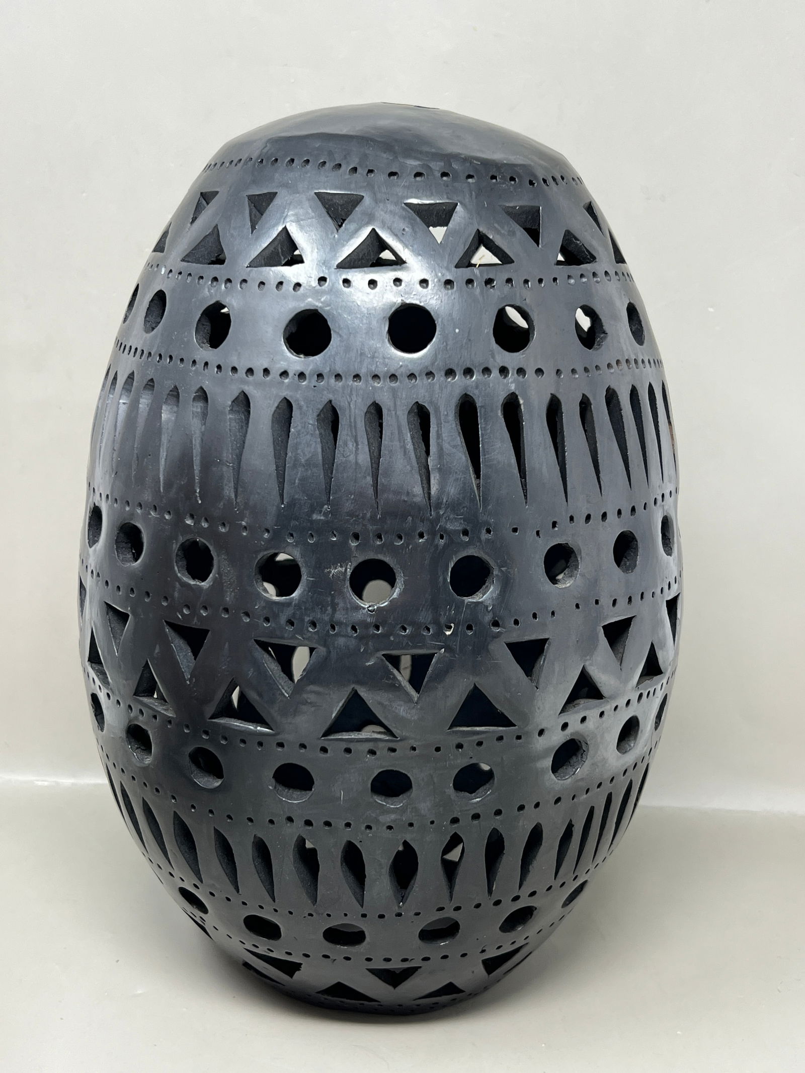 Large Oaxacan Barro Black Pottery Egg Cutwork Luminaria: has a few small chips on inside lip, shown in photos