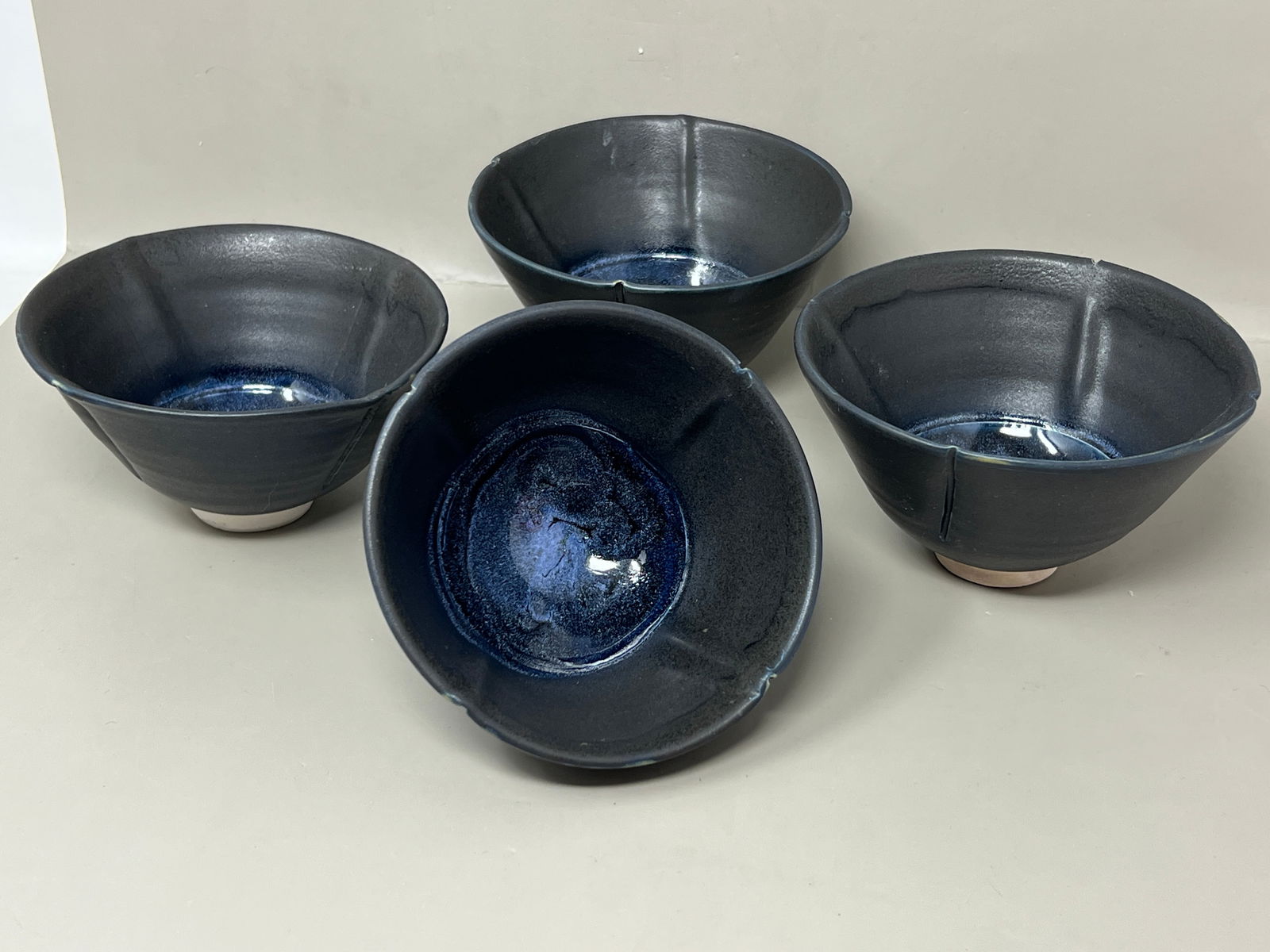 Set of Four Matte Glaze Studio Pottery Lotus Bowls Signed "Sandy": great matte glaze