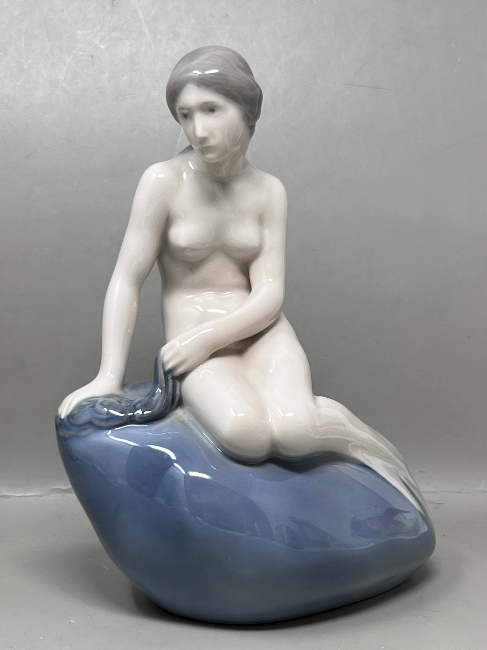 Royal Copenhagen 'LIttle Mermaid" Porcelain FIgurine: Designed by Edvard Eriksen